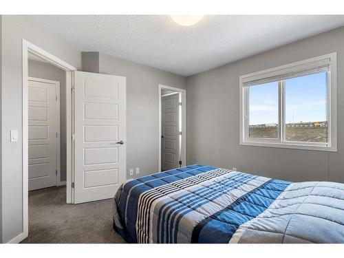 510 Panatella Walk Nw, Calgary, AB - Indoor Photo Showing Bedroom