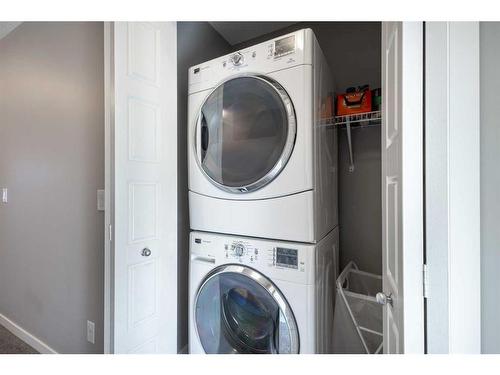 510 Panatella Walk Nw, Calgary, AB - Indoor Photo Showing Laundry Room