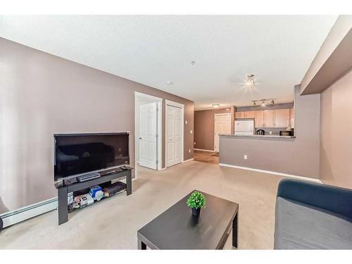 9119-70 Panamount Drive Nw, Calgary, AB - Indoor Photo Showing Living Room