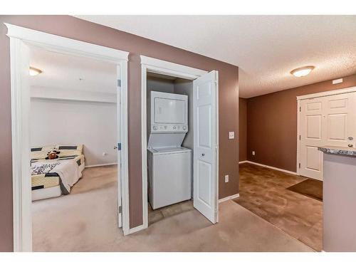 9119-70 Panamount Drive Nw, Calgary, AB - Indoor Photo Showing Laundry Room