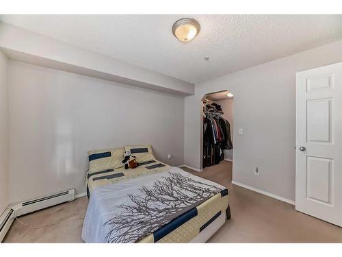 9119-70 Panamount Drive Nw, Calgary, AB - Indoor Photo Showing Bedroom