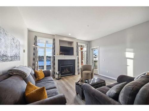 1314-1314 Lake Fraser Green Se, Calgary, AB - Indoor Photo Showing Living Room With Fireplace