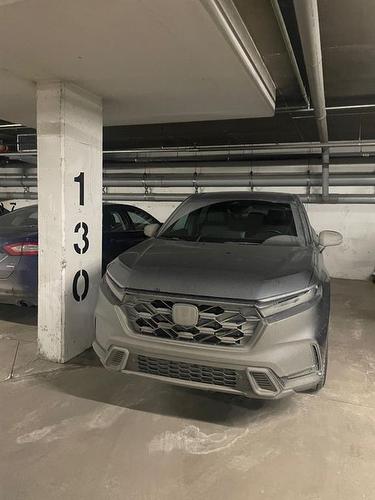 412-1410 2 Street Sw, Calgary, AB - Indoor Photo Showing Garage