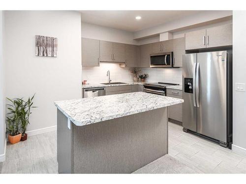 1208-80 Greenbriar Place Nw, Calgary, AB - Indoor Photo Showing Kitchen With Stainless Steel Kitchen With Upgraded Kitchen