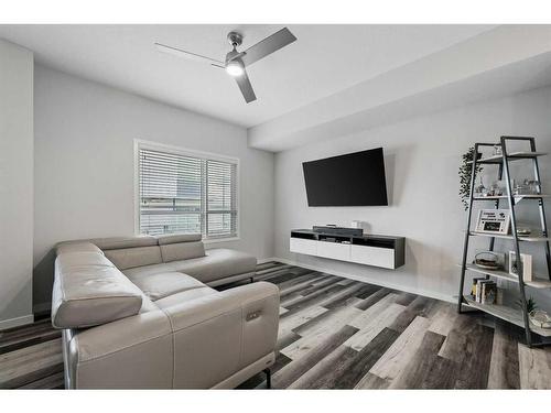 606 Harvest Grove Walk Ne, Calgary, AB - Indoor Photo Showing Living Room