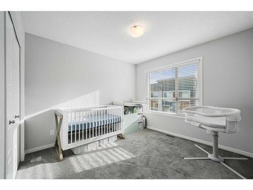 606 Harvest Grove Walk Ne, Calgary, AB - Indoor Photo Showing Bedroom