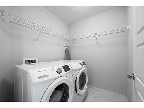 606 Harvest Grove Walk Ne, Calgary, AB - Indoor Photo Showing Laundry Room