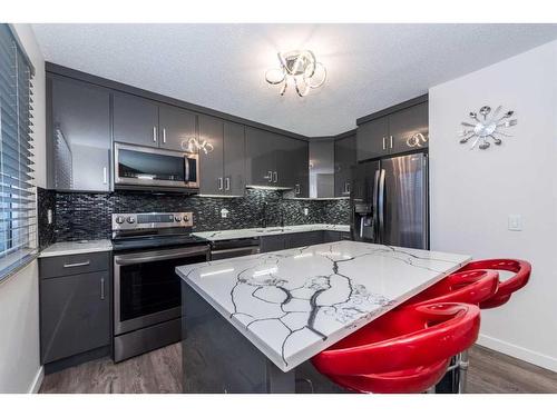 86-3029 Rundleson Road Ne, Calgary, AB - Indoor Photo Showing Kitchen With Stainless Steel Kitchen With Upgraded Kitchen