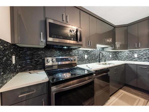 86-3029 Rundleson Road Ne, Calgary, AB - Indoor Photo Showing Kitchen With Stainless Steel Kitchen With Upgraded Kitchen