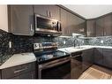 86-3029 Rundleson Road Ne, Calgary, AB  - Indoor Photo Showing Kitchen With Stainless Steel Kitchen With Upgraded Kitchen 