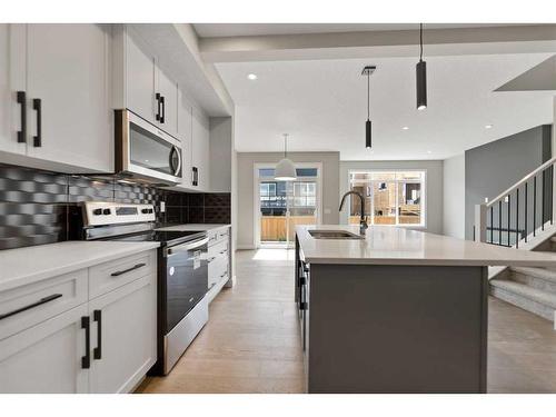 137 Waterford Heath, Chestermere, AB - Indoor Photo Showing Kitchen