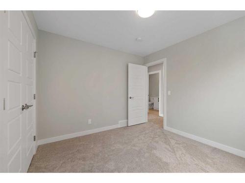 137 Waterford Heath, Chestermere, AB - Indoor Photo Showing Other Room