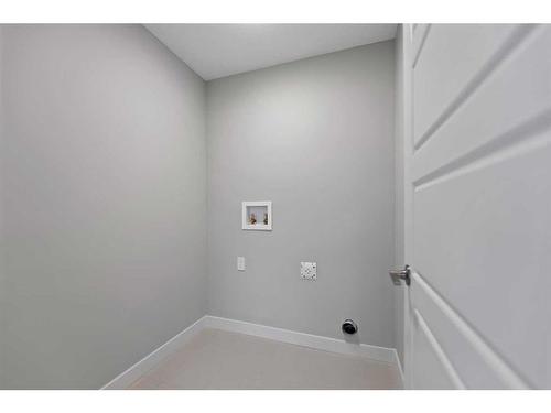 137 Waterford Heath, Chestermere, AB - Indoor Photo Showing Other Room