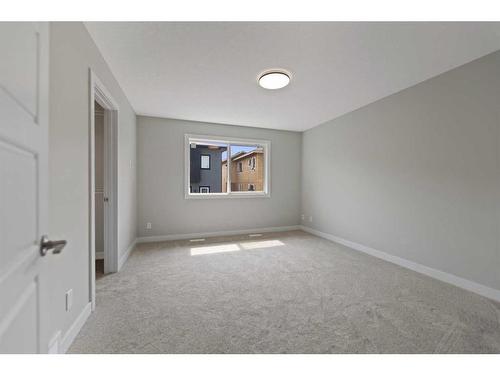 137 Waterford Heath, Chestermere, AB - Indoor Photo Showing Other Room