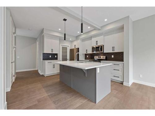 137 Waterford Heath, Chestermere, AB - Indoor Photo Showing Kitchen With Upgraded Kitchen