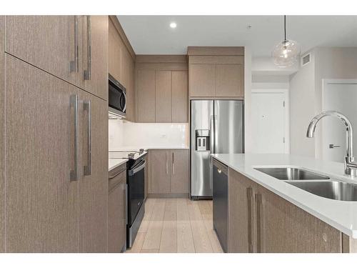 2212-395 Skyview Parkway Ne, Calgary, AB - Indoor Photo Showing Kitchen With Stainless Steel Kitchen With Double Sink With Upgraded Kitchen