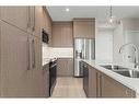 2212-395 Skyview Parkway Ne, Calgary, AB  - Indoor Photo Showing Kitchen With Stainless Steel Kitchen With Double Sink With Upgraded Kitchen 