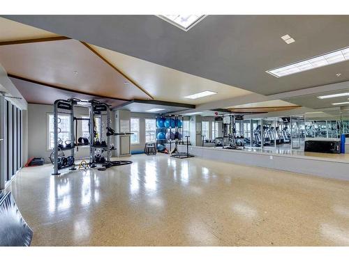 2204-11811 Lake Fraser Drive Se, Calgary, AB - Indoor Photo Showing Gym Room