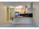 2204-11811 Lake Fraser Drive Se, Calgary, AB  - Indoor Photo Showing Kitchen With Double Sink 