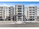 2312-4641 128 Avenue Ne, Calgary, AB  - Outdoor With Balcony With Facade 