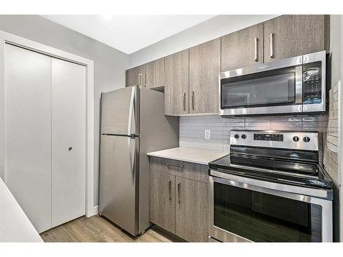 2312-4641 128 Avenue Ne, Calgary, AB - Indoor Photo Showing Kitchen With Stainless Steel Kitchen