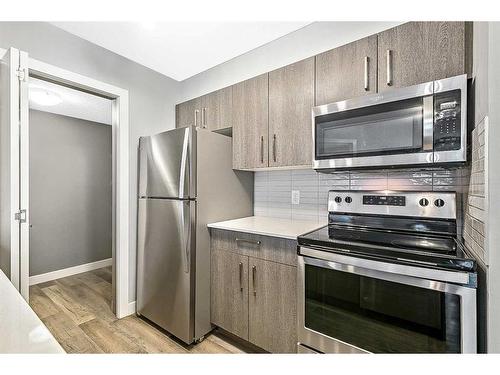 2312-4641 128 Avenue Ne, Calgary, AB - Indoor Photo Showing Kitchen With Stainless Steel Kitchen