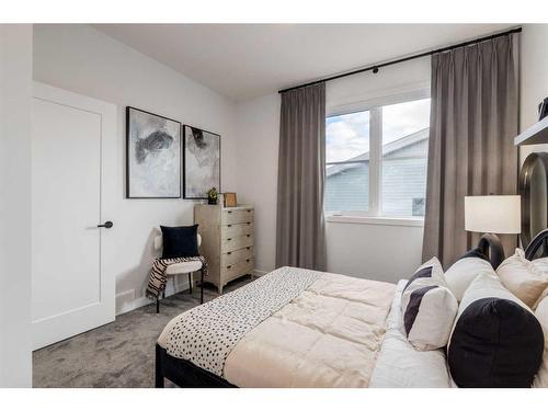 410-1453 Na'A Drive Sw, Calgary, AB - Indoor Photo Showing Bedroom