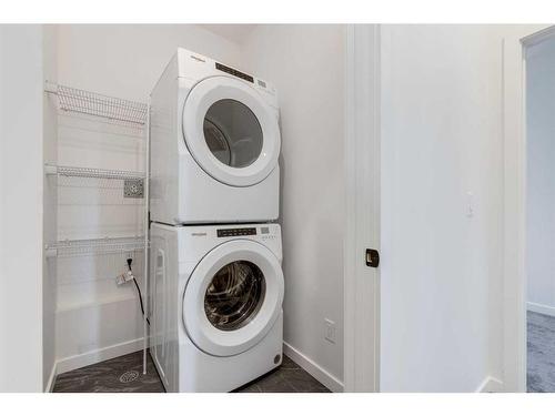 410-1453 Na'A Drive Sw, Calgary, AB - Indoor Photo Showing Laundry Room