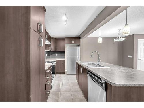 148 Cityscape Row Ne, Calgary, AB - Indoor Photo Showing Kitchen With Stainless Steel Kitchen With Double Sink