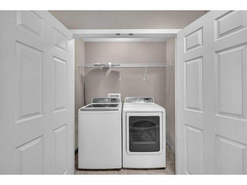 148 Cityscape Row Ne, Calgary, AB - Indoor Photo Showing Laundry Room