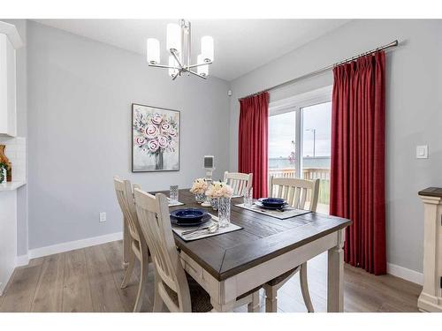 108 Ranchers View, Okotoks, AB - Indoor Photo Showing Dining Room