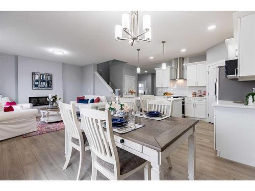 108 Ranchers View, Okotoks, AB - Indoor Photo Showing Dining Room