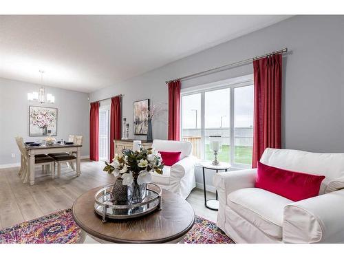 108 Ranchers View, Okotoks, AB - Indoor Photo Showing Living Room