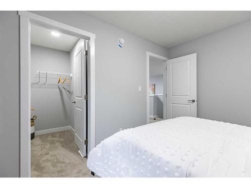 108 Ranchers View, Okotoks, AB - Indoor Photo Showing Bedroom