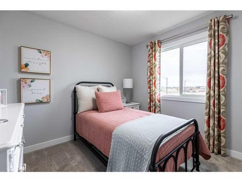 108 Ranchers View, Okotoks, AB - Indoor Photo Showing Bedroom