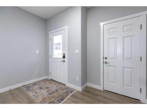 108 Ranchers View, Okotoks, AB - Indoor Photo Showing Other Room