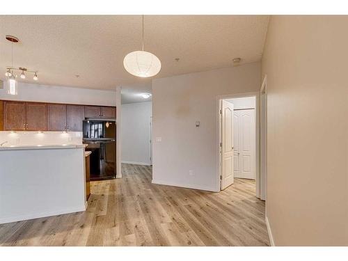 126-1 Crystal Green Lane, Okotoks, AB - Indoor Photo Showing Kitchen