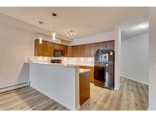 126-1 Crystal Green Lane, Okotoks, AB - Indoor Photo Showing Kitchen