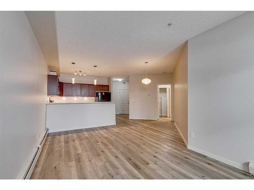 126-1 Crystal Green Lane, Okotoks, AB - Indoor Photo Showing Kitchen