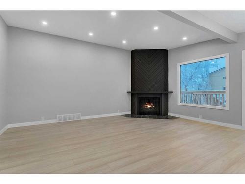 3443 35 Avenue Se, Calgary, AB - Indoor With Fireplace