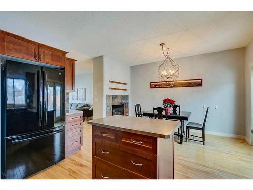 86 Cougartown Circle Sw, Calgary, AB - Indoor With Fireplace