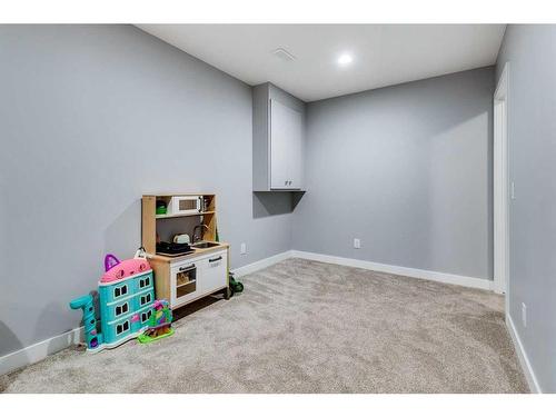 86 Cougartown Circle Sw, Calgary, AB - Indoor Photo Showing Other Room