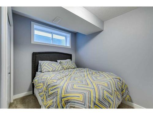 86 Cougartown Circle Sw, Calgary, AB - Indoor Photo Showing Bedroom