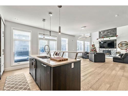 86 West Point Mews Sw, Calgary, AB - Indoor Photo Showing Kitchen With Double Sink With Upgraded Kitchen