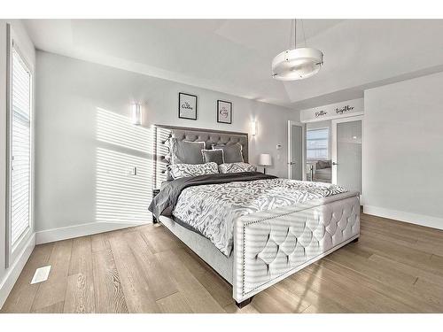 86 West Point Mews Sw, Calgary, AB - Indoor Photo Showing Bedroom