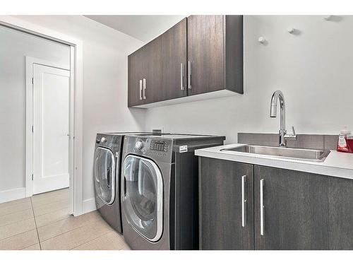 86 West Point Mews Sw, Calgary, AB - Indoor Photo Showing Laundry Room