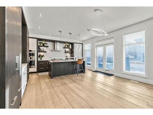 86 West Point Mews Sw, Calgary, AB - Indoor Photo Showing Kitchen With Upgraded Kitchen