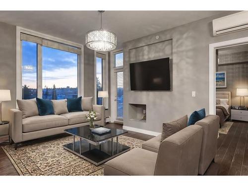 408-119 19 Street Nw, Calgary, AB - Indoor Photo Showing Living Room With Fireplace