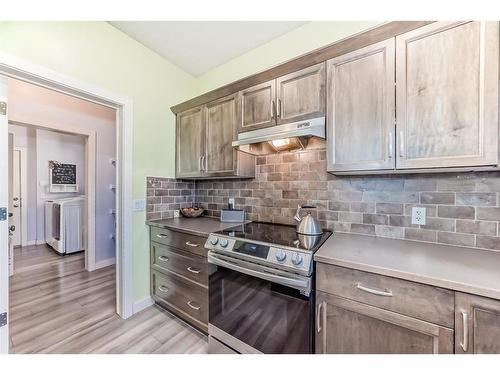 196 Sunset Circle, Cochrane, AB - Indoor Photo Showing Kitchen