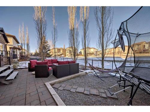 196 Sunset Circle, Cochrane, AB - Indoor Photo Showing Living Room With Fireplace